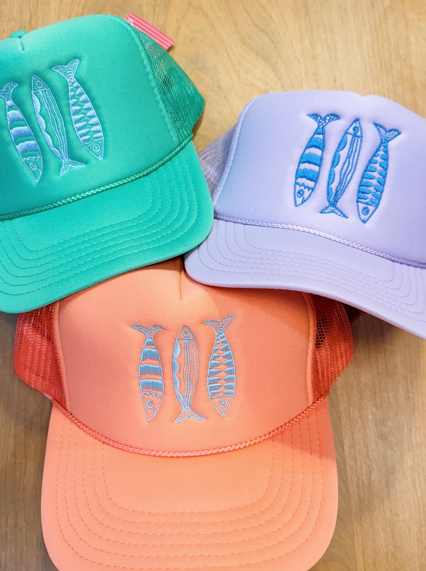 Sardine Summer Trucker Hat: Coral hat | light blue thread