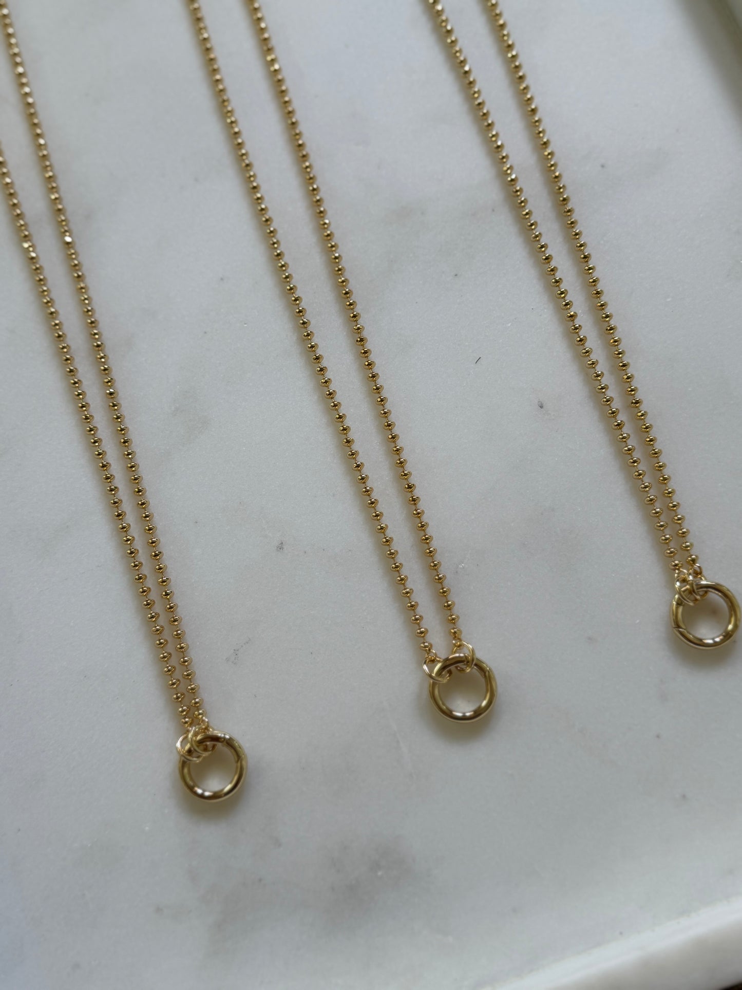 Gold Beaded Charm Necklace